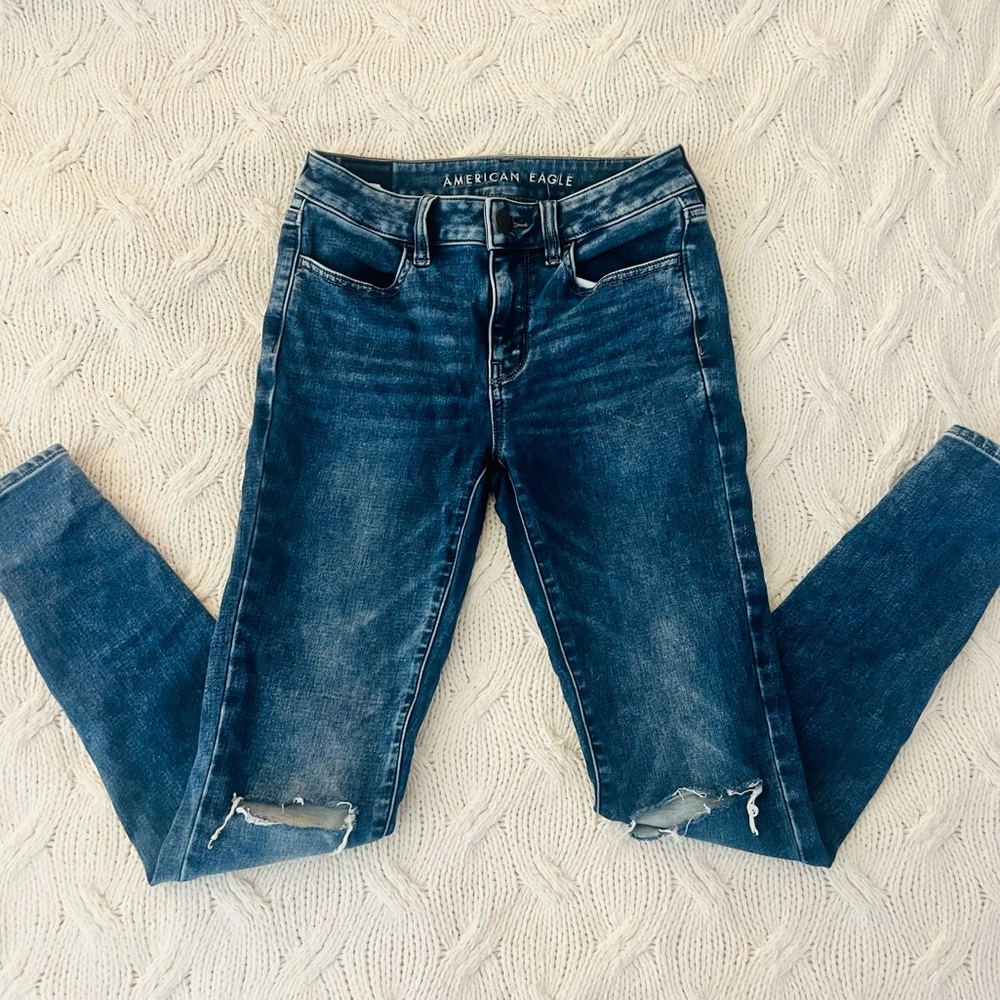 AE Holey Knee Super Stretch Skinny Jeans